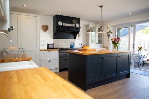 Kitchen with large island and over head lighting
