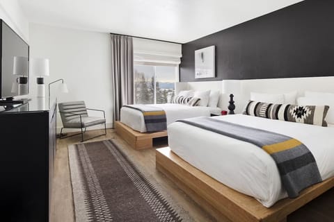 Recharge in a bright double-bed room with hotel-crisp linens.