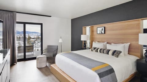 Wake up to balcony views and a serene, cloud-soft bed.