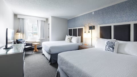 Settle into two plush beds after a mountain day.