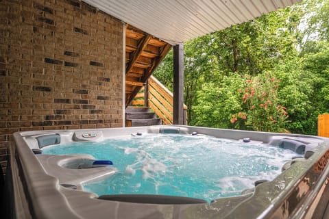 Hot tub Heaven: 7 person Luxurious Hot Tub Grab your drink, hit that jet button, and let seven people melt into the bubbly bliss. Stargazing encouraged. Relaxation required.