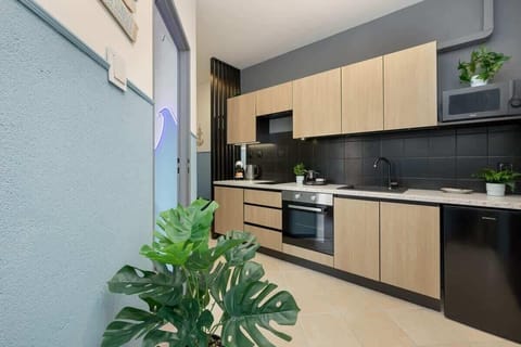 The kitchenette's practical layout maximizes space and functionality.