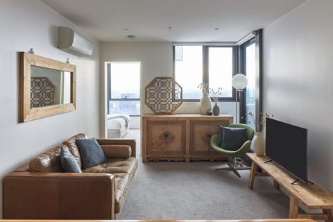 Unwind on the sofa with a movie in the lounge area, making use of split system air conditioning and heating for year-round comfort. 