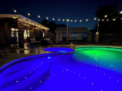 Nighttime view of the yard area from the pool!