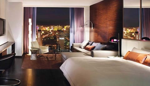 Strip View Balcony Studio Suite - Living room with queen size sofa bed may accommodate additional 2 guests.