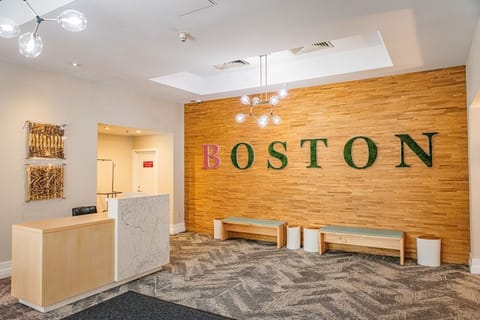 Walk into a bright, modern lobby with local character.