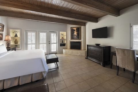 Settle in for cozy nights with fireplace ambiance and TV.