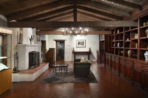 Sip, read, and relax in this cozy, curated sitting area.