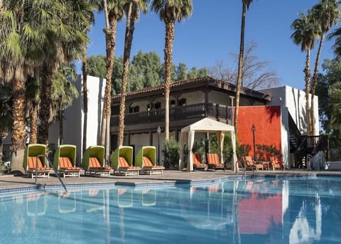 Enjoy peaceful pool views with classic architecture as your backdrop.