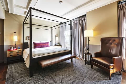 Stretch out beside tall windows and relax in the lounge chair.