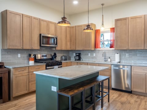 Fully Equipped Kitchen with stainless steel appliances and granite countertops!