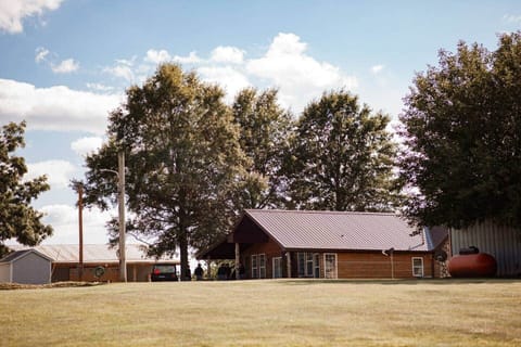 A view of the back of cabin from the lake.
