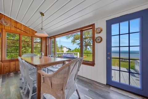 Front porch with a large table for families to enjoy