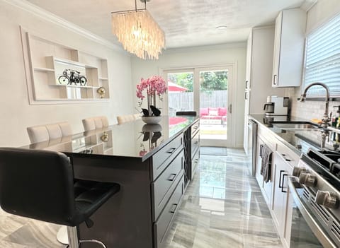 Large kitchen island for addition seating area.