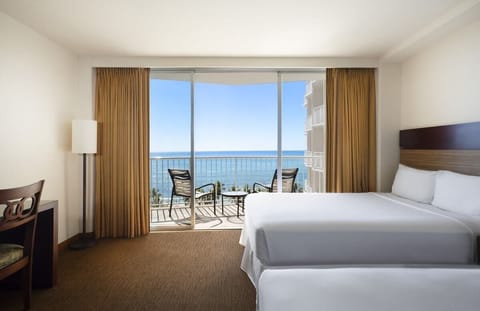 Step onto the balcony and savor sparkling ocean horizons.