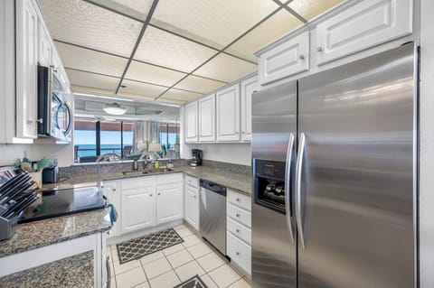 Fully equipped with stainless steel fridge, oven, microwave & dishwasher.