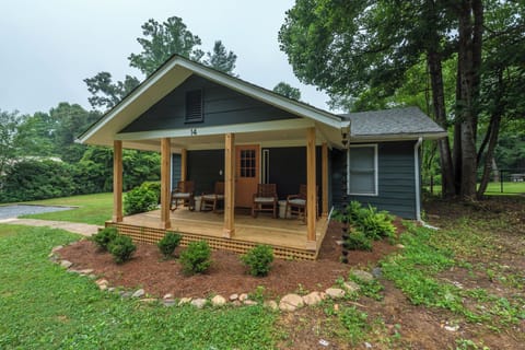 Covered front porch with rocking chairs—ideal for morning coffee or quiet reflection