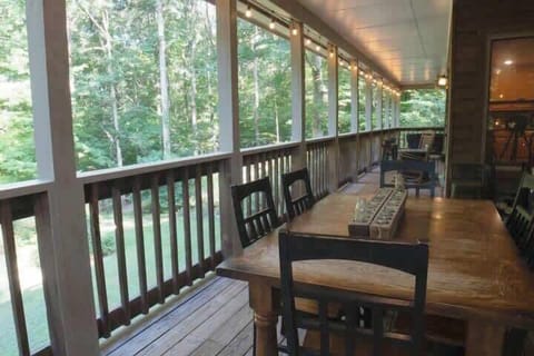Beautiful back porch overlooking mature woods and back yard!