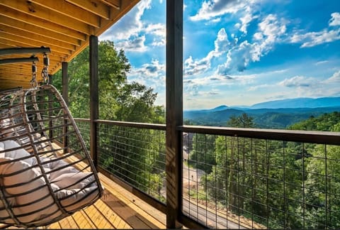 Swing into relaxation on the stunning balcony with breathtaking mountain views!