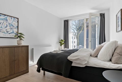 First bathroom with french balcony and lots of natural light. Also with a closet for your personal belongings, along with bedside table and double-curtains (Thin curtains and blackout curtains).