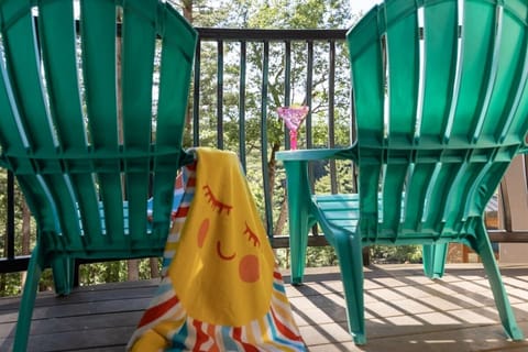 "Unwind with a refreshing drink on the not used cozy balcony."