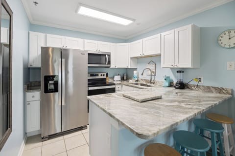 Grand Caribbean West Unit 103W by PKRM