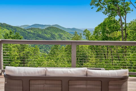 Experience peak relaxation with breathtaking Blue Ridge views from our luxury Asheville mountain retreat