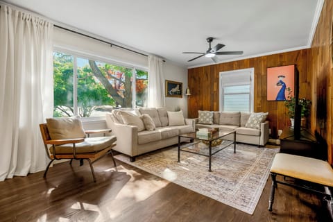 Main floor: spacious and bright living room complete with a Smart TV