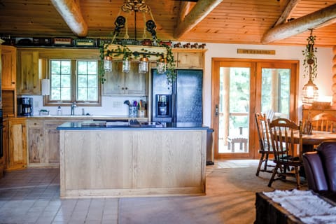 Kitchen complete with refrigerator, cook stove, oven, microwave and dishwasher.