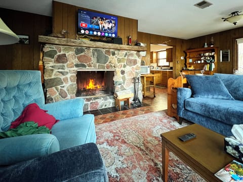 Cozy up by the wood fireplace! 