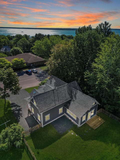 Enjoy this charming home with views of Lake Superior from upstairs rooms. 