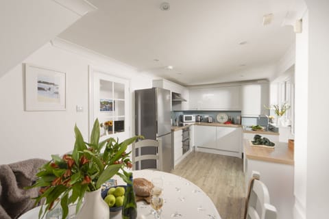 Castaways, Porthtowan. Ground Floor: The beautifully presented open plan kitchen/dining area