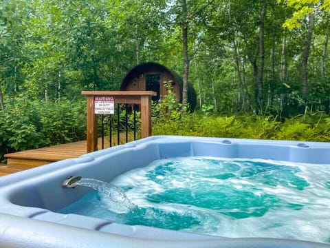 Outdoor hot tub off the back of the Clubhouse