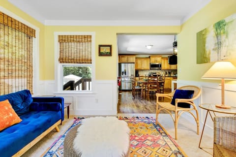 Den just off the kitchen is perfect for visiting with loved ones