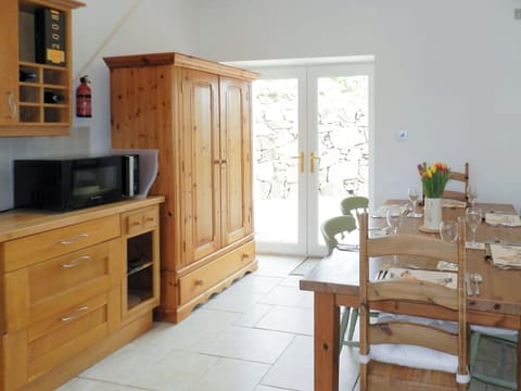 Stylish kitchen and dining area | Torbeg Farm Cottage, Torbeg, near Blackwaterfoot, Isle of Arran
