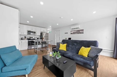 Living Room: Enjoy modern comforts in the eco-friendly ambiance of our home