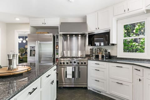 A modern kitchen with a fully equipped gas stove