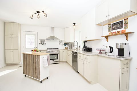The coffee bar is equipped with a Keurig and electronic tea kettle.