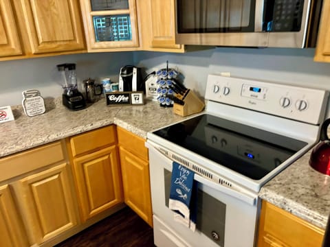 Kitchen: Modern appliances and a coffee lover's paradise await culinary adventures!