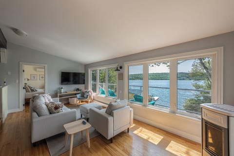 Living Area with Expansive Views of Prospect Bay +  55' Smart TV