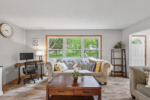 Living Room With Windows Overlooking Front Yard