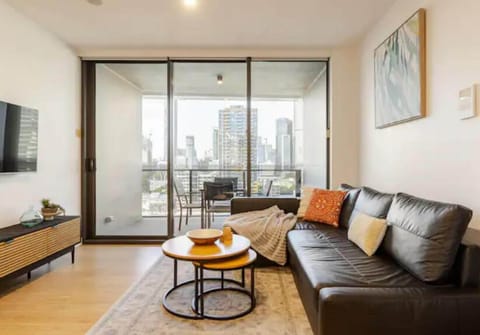 Living area, balcony and city view