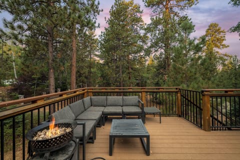 Back Deck - Back Deck with Treetop views and walking trail into the village. Private hot tub, fire pit, and comfy seating