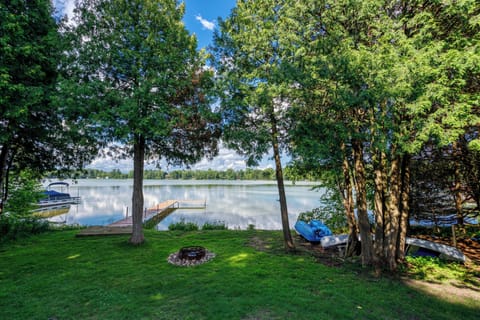 Private lake front with permanent dock, bonfire pit and several water vessels provided