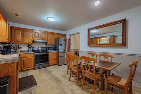 full kitchen features stove, frig, dishwasher, keurig and toaster.