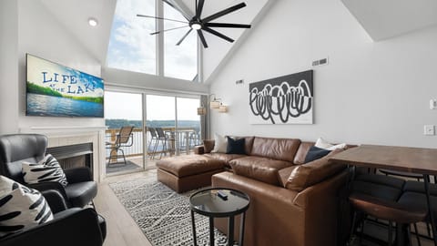 Beautiful Open living area with oversized leather sectional. 