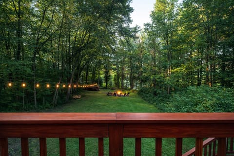 Relax under the trees with string lights, a firepit, and p space to unwind.