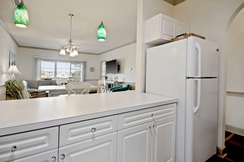 The kitchen is well stocked. There are dishes, utensils, pots, pans & bakeware.