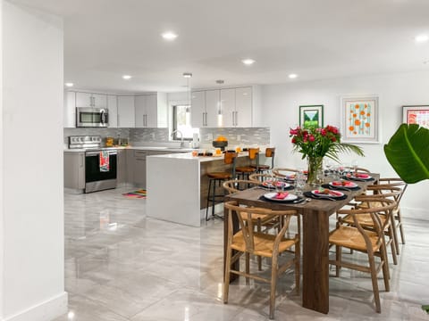 Dining Area + Kitchen | Open concept makes the most of your gatherings.