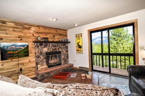 Living area w/ woodburning fireplace